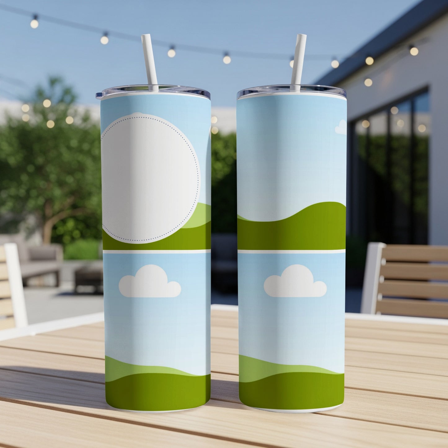 Two tumblers with a sky, cloud, and rolling hills design.