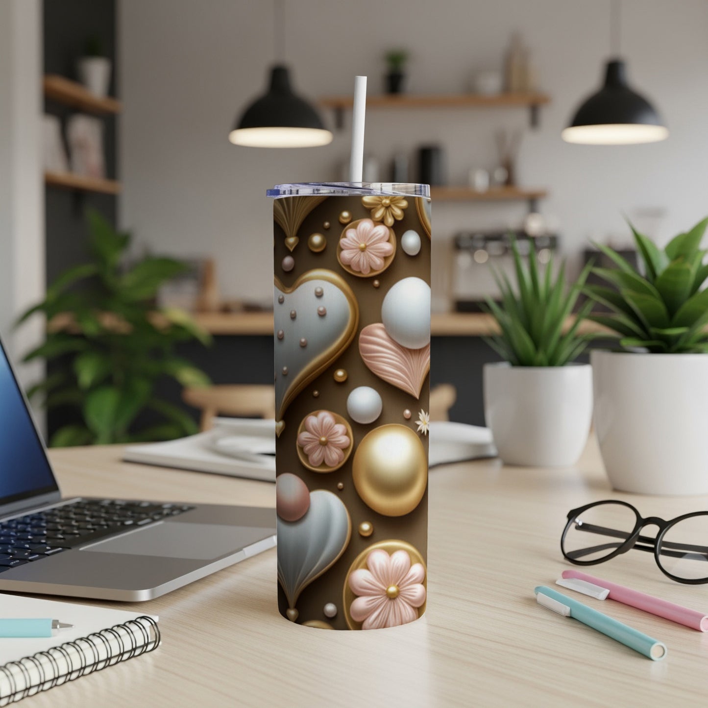 Brown tumbler with gold and pink hearts, flowers, and pearls pattern.