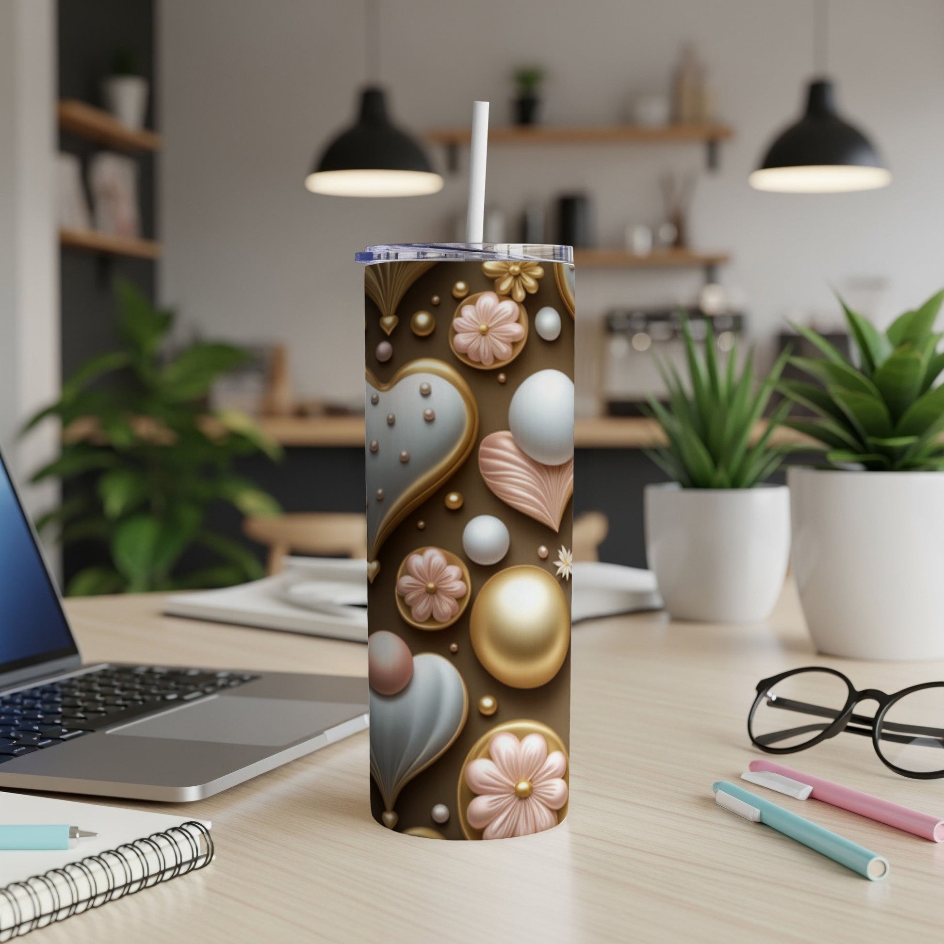 Brown tumbler with gold and pink hearts, flowers, and pearls pattern.