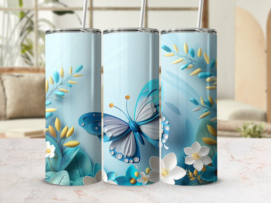 Blue butterfly with floral accents on a light blue gradient tumbler.