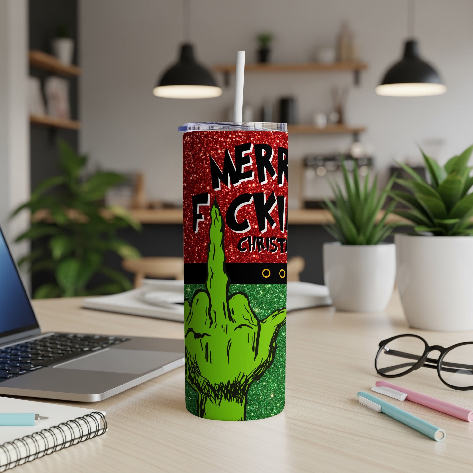 Green glitter tumbler with middle finger and "Merry F\*cking Christmas" text.