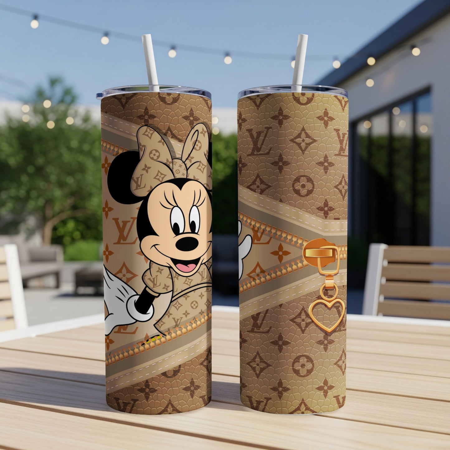 Minnie Mouse in brown designer pattern tumbler with gold zipper and heart charm.