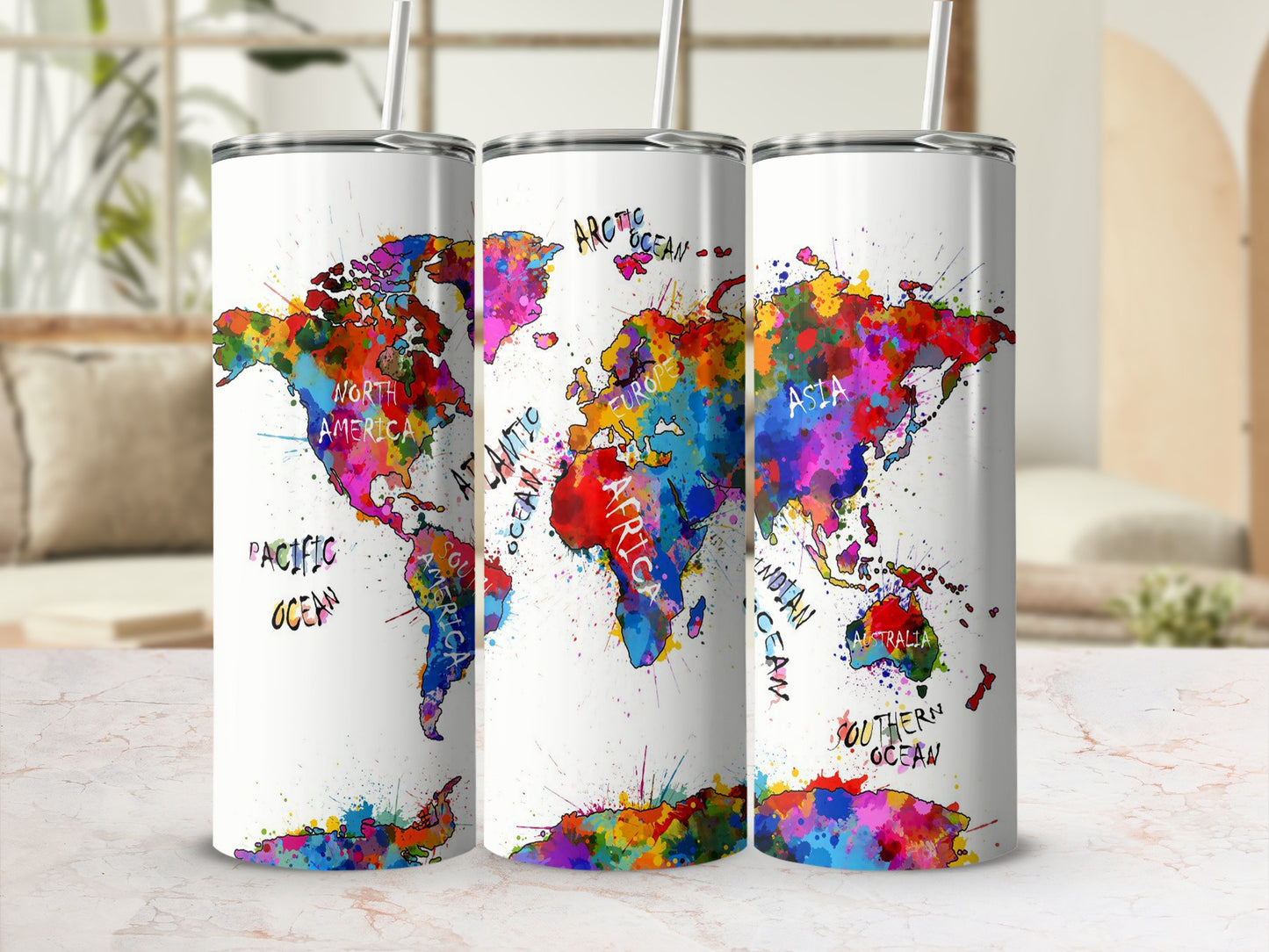 Three tumblers display a colorful, ink-splatter map of the world with continents labeled.