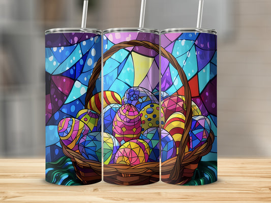 Easter basket overflowing with colorful, mosaic-style eggs and a straw.