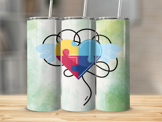 Heart and Puzzle Design on Green Background Tumbler