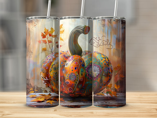 Triptych of tumblers featuring a large, ornate pumpkin with autumn leaves and rustic background.
