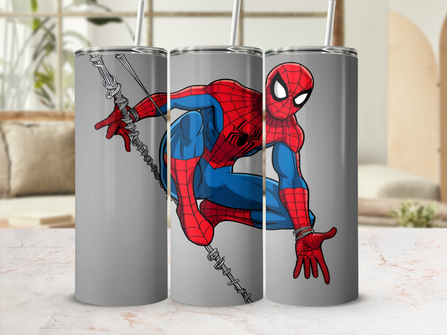 Spider-Man in costume on a gray tumbler with a straw.
