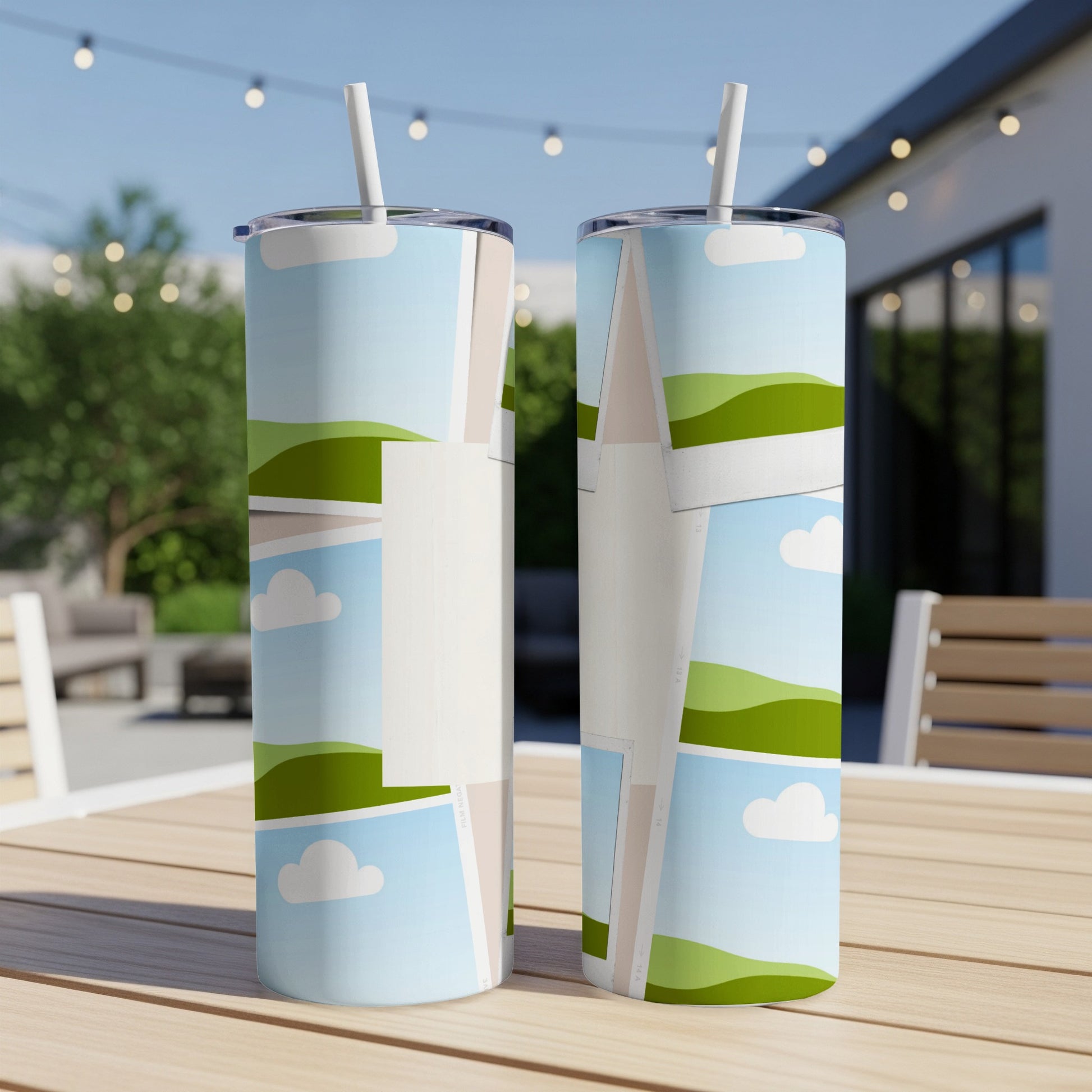 Two tumblers with a collage of sky, clouds, and rolling green hills.