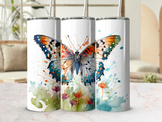 Three tumblers with watercolor butterfly and floral designs.
