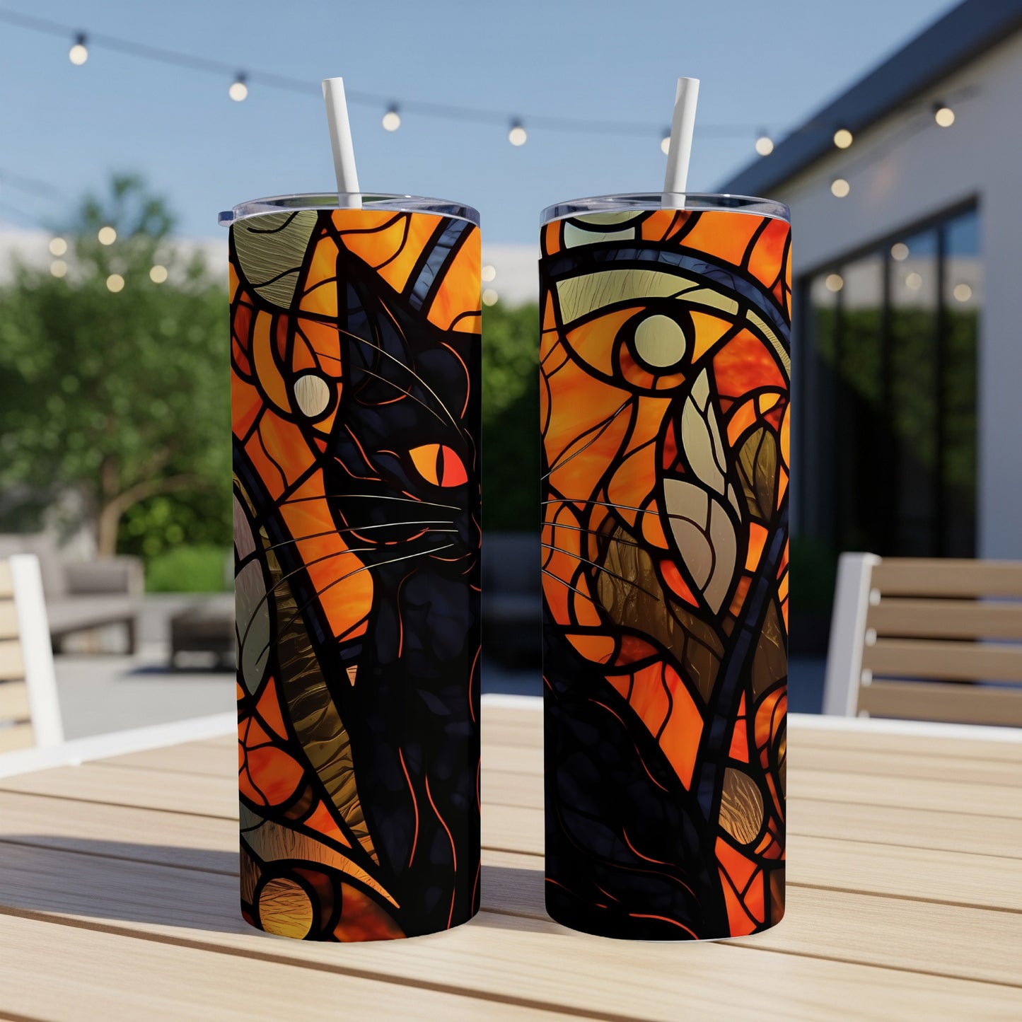 Black cat with red eyes in stained glass pattern on a tumbler.