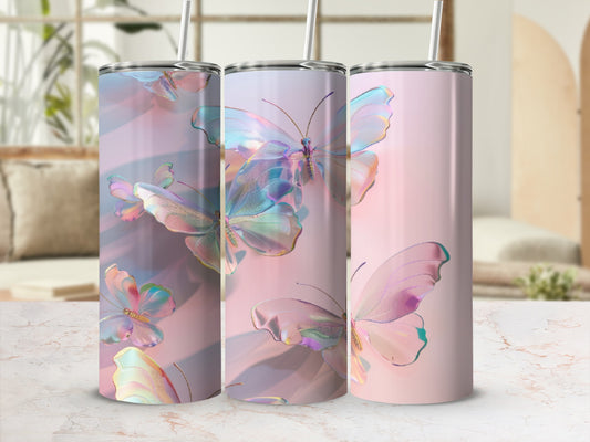 Three tumblers with iridescent butterflies, soft pink and purple background.