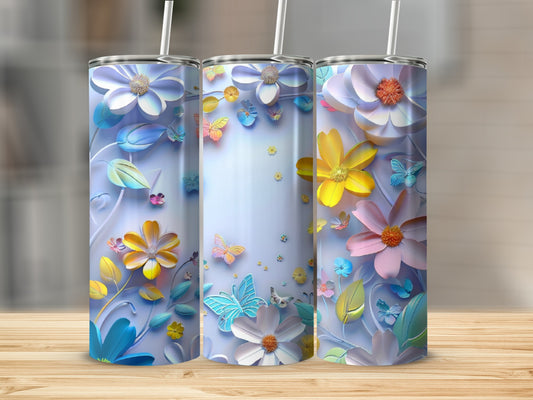 Three tall tumblers with floral and butterfly designs.