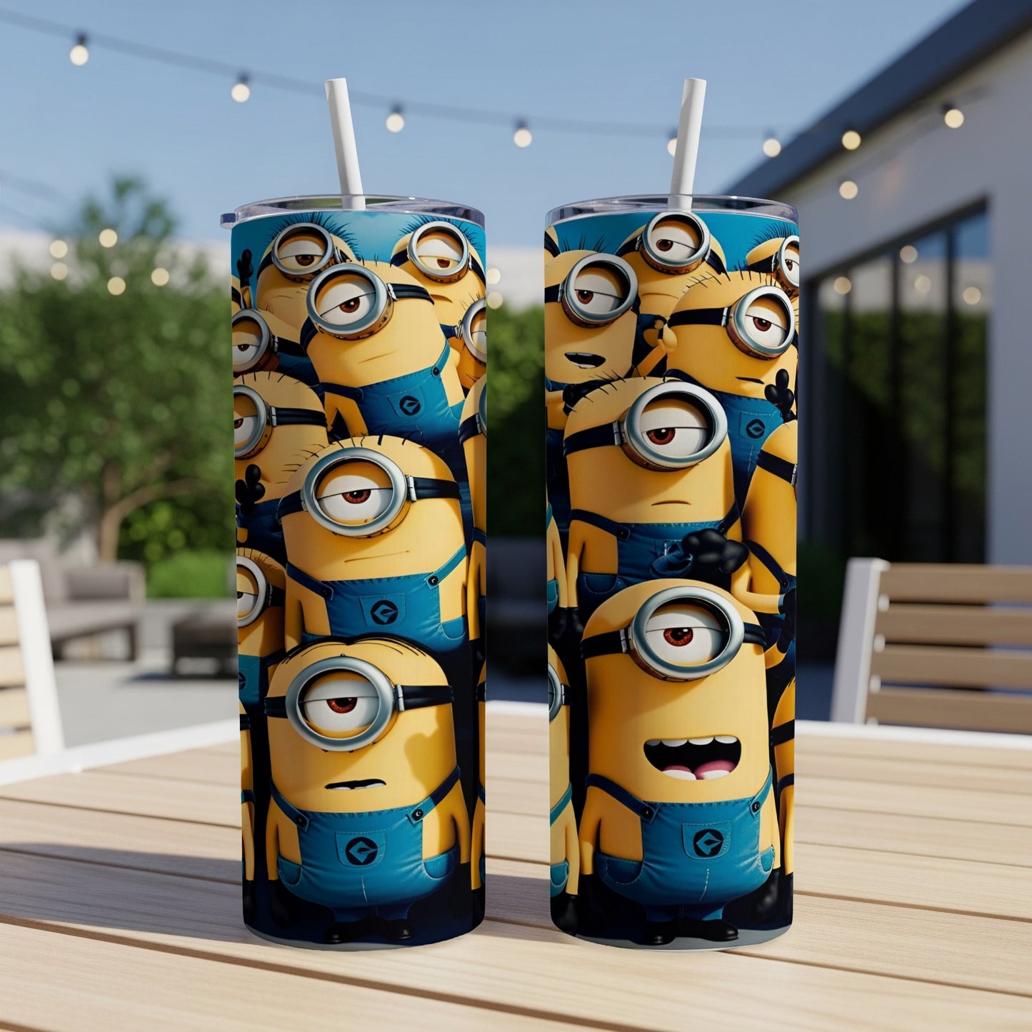 Two tall tumblers with cartoon Minion characters in yellow overalls.