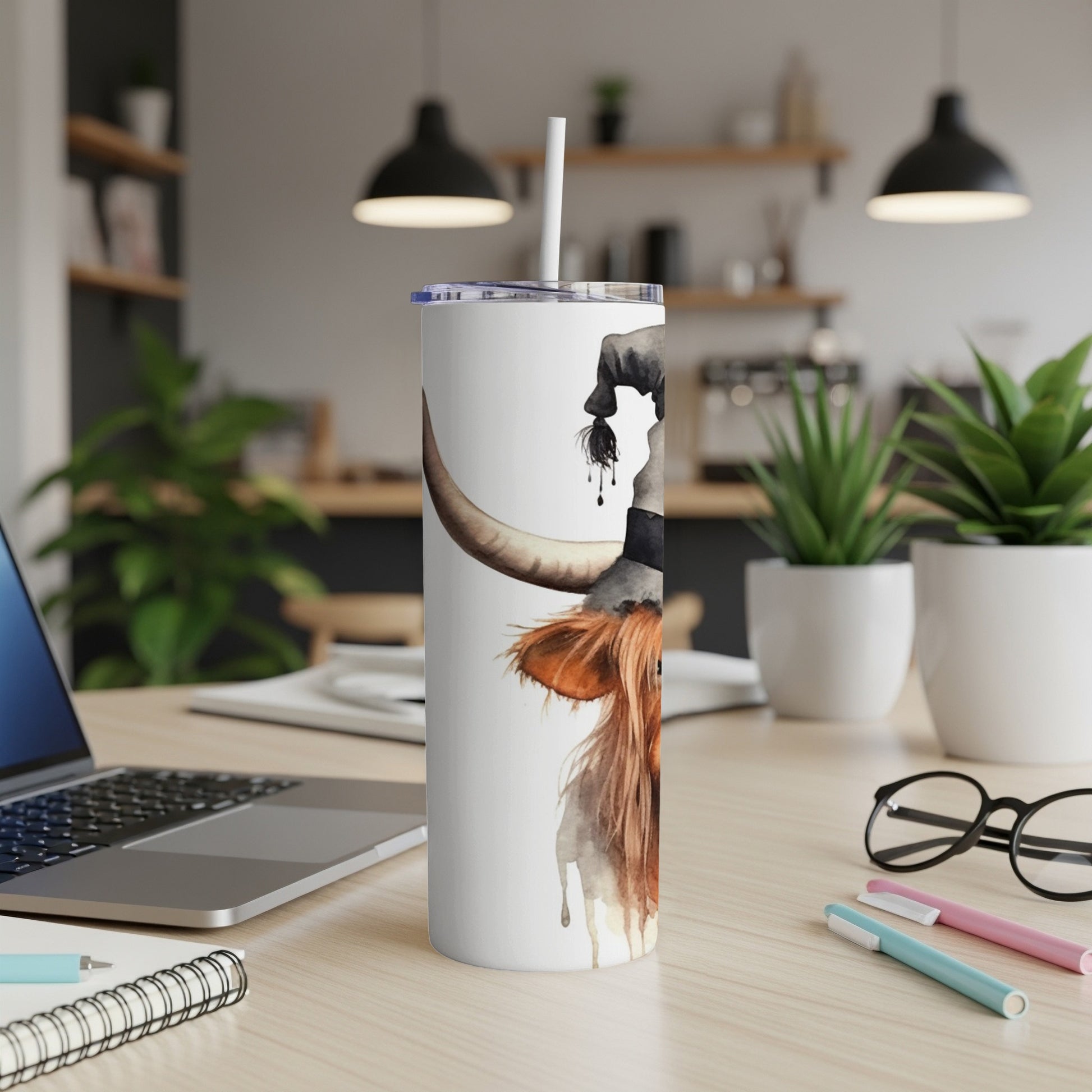 Tumbler featuring watercolor Highland cow wearing a witch hat.