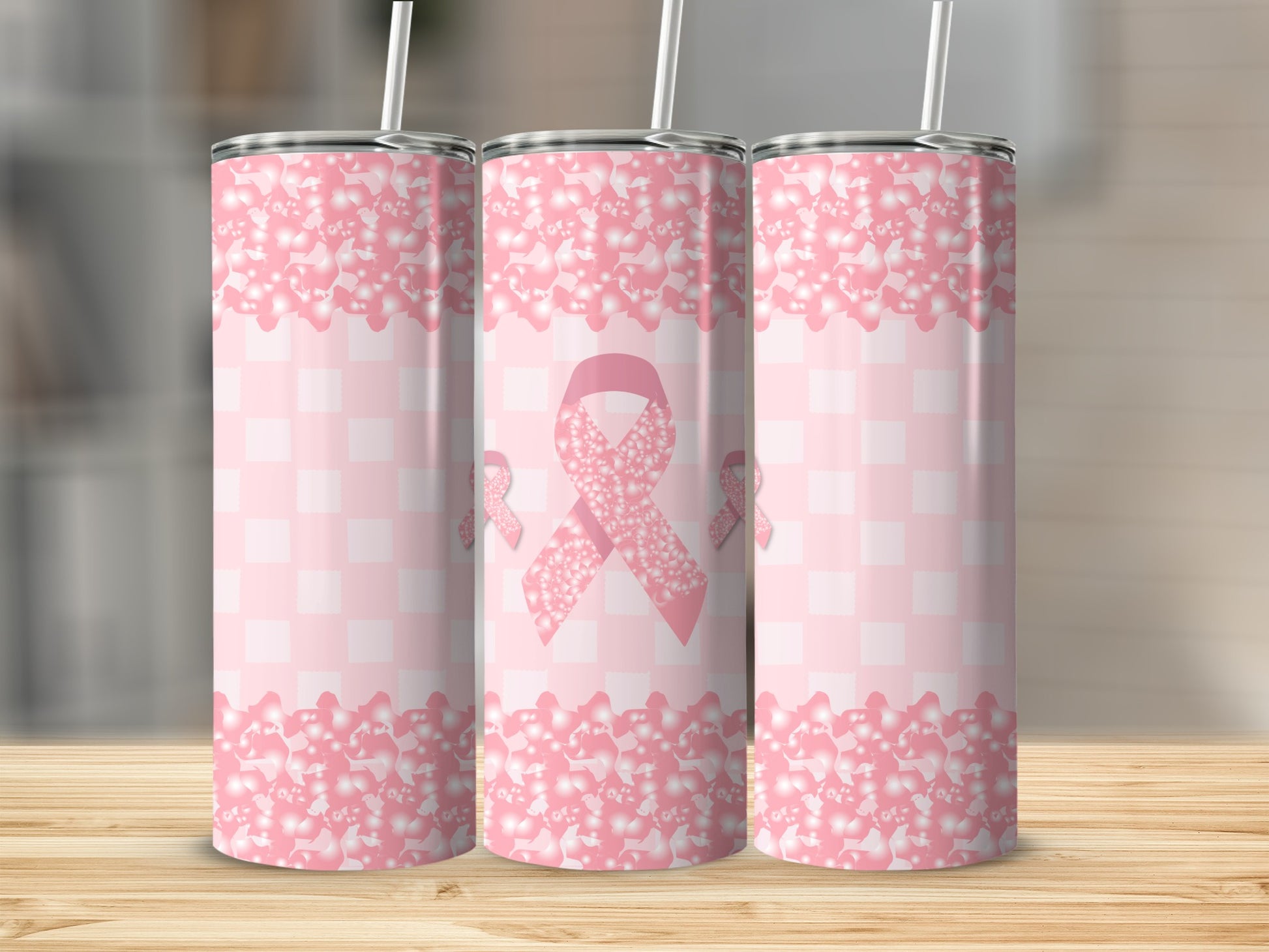 Three pink gingham tumblers with a floral ribbon pattern.
