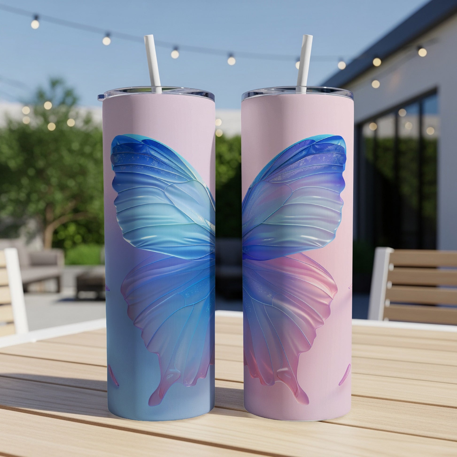 Two tall pink tumblers with iridescent blue and pink butterfly wings.