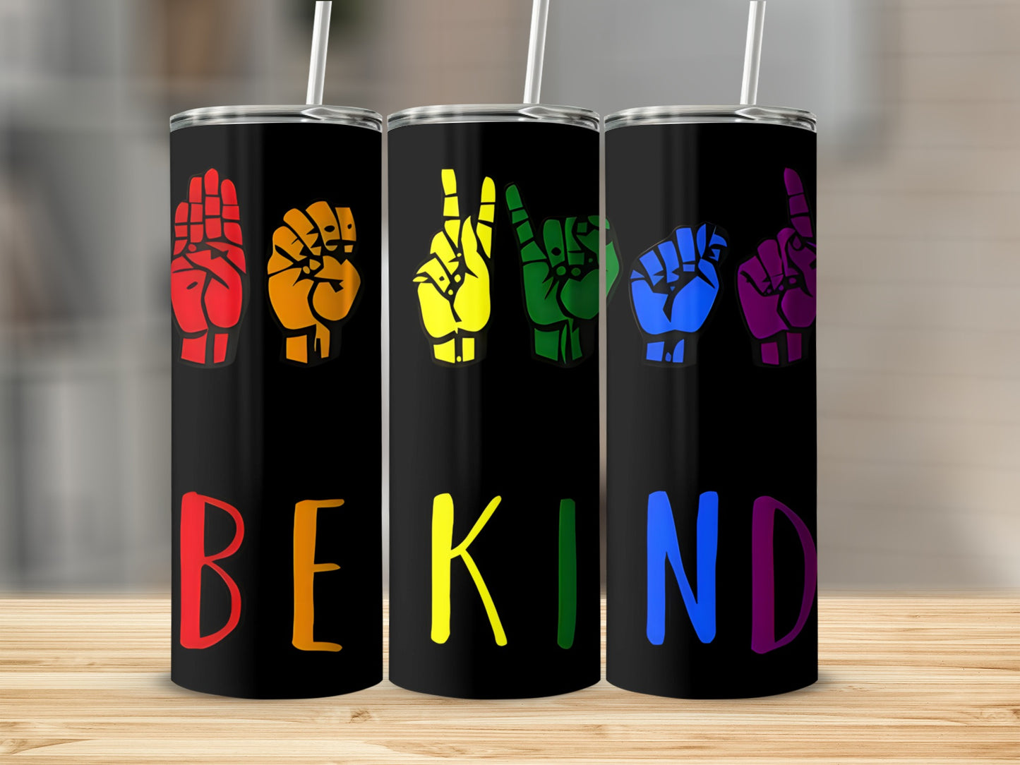 Black tumbler with rainbow sign language hands spelling "BE KIND."