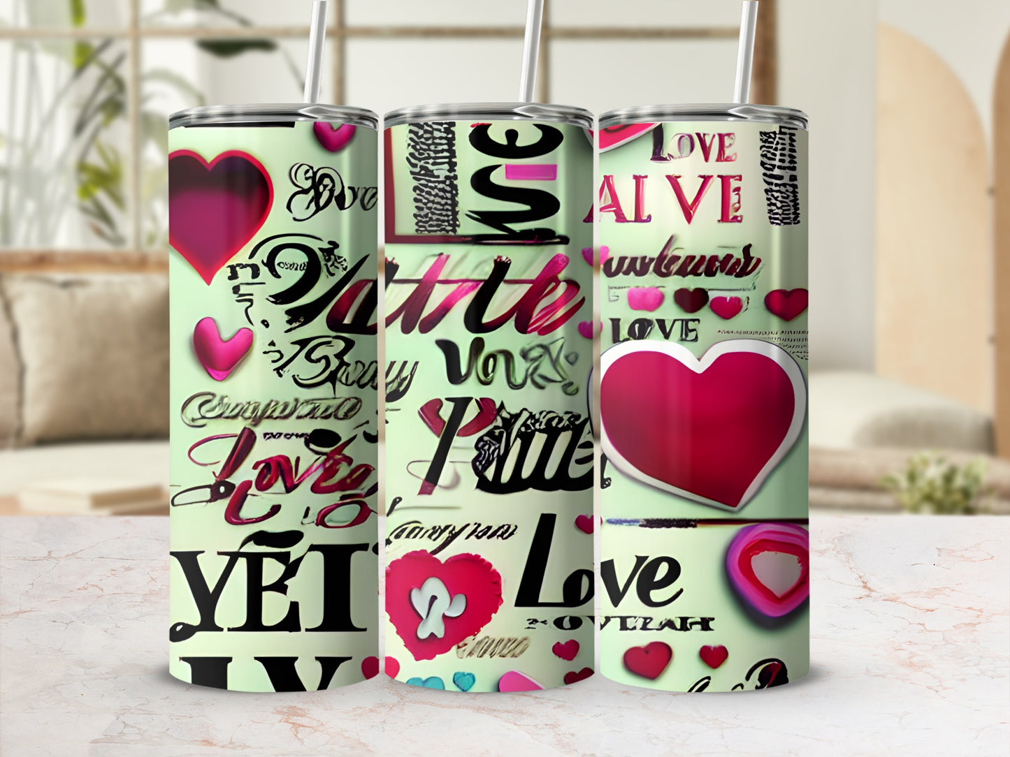 Three stainless steel tumblers with hearts and "Love" text.