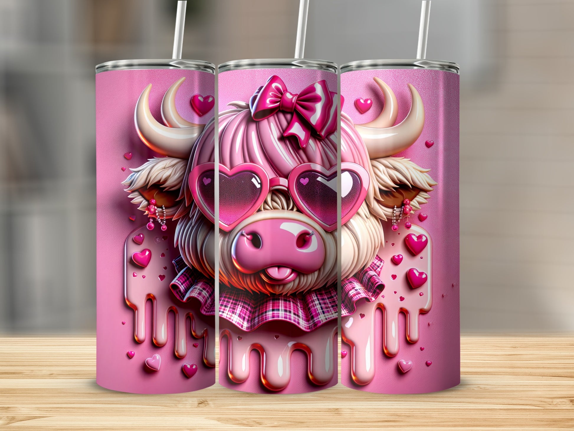 Pink cow tumbler with heart sunglasses and bow, on wooden surface.