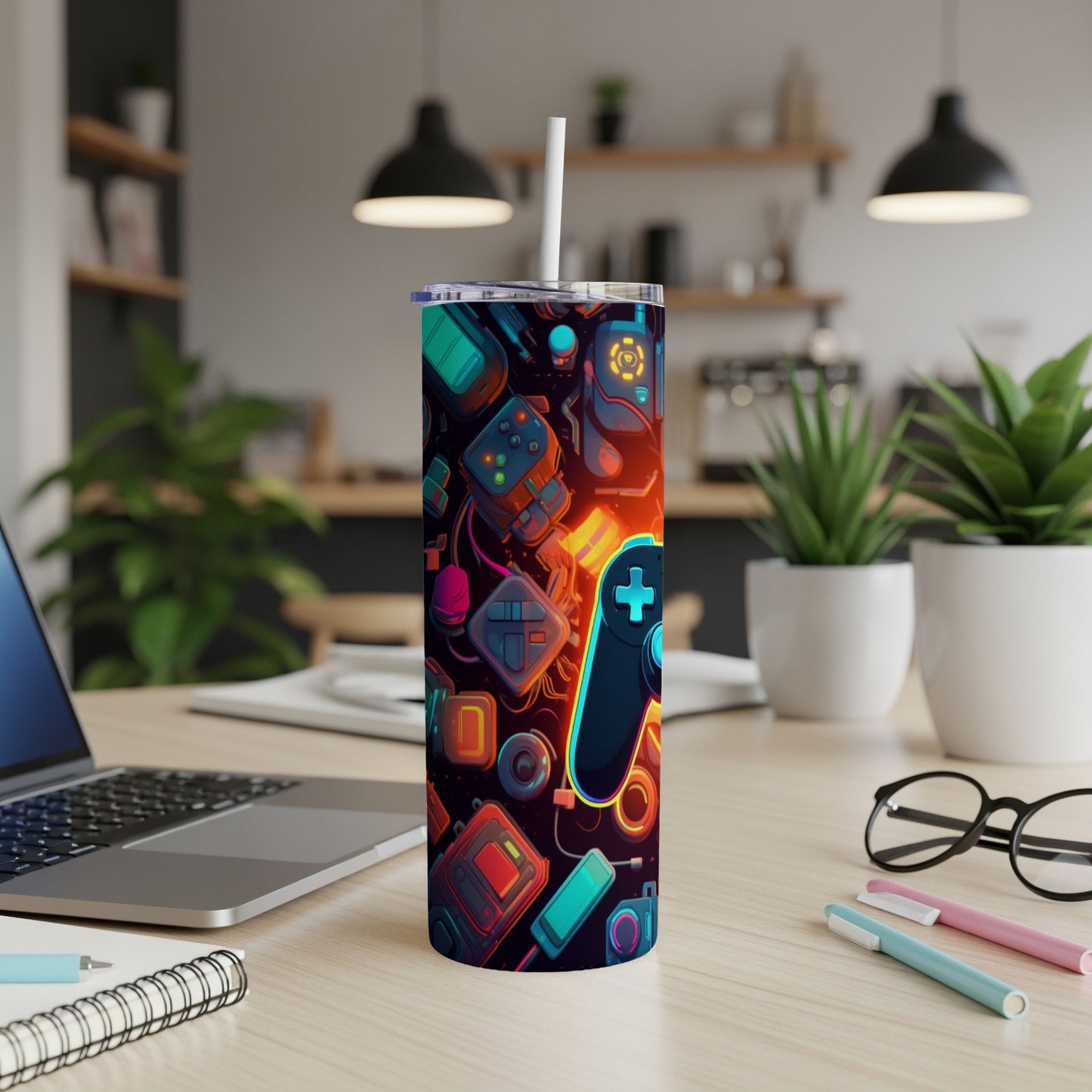Gaming-themed tumbler with controllers, buttons, and neon accents.