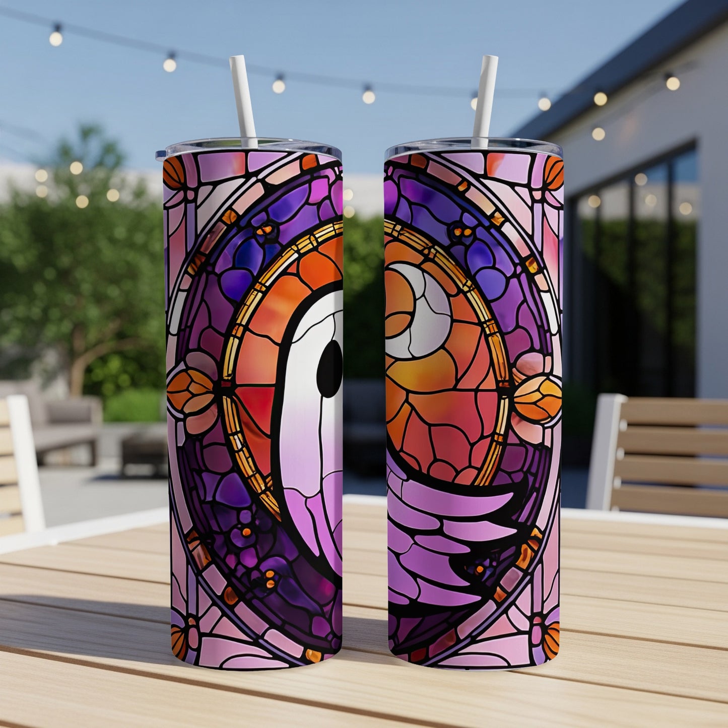 Two tumblers with stained-glass style design featuring a crescent moon and abstract floral elements.