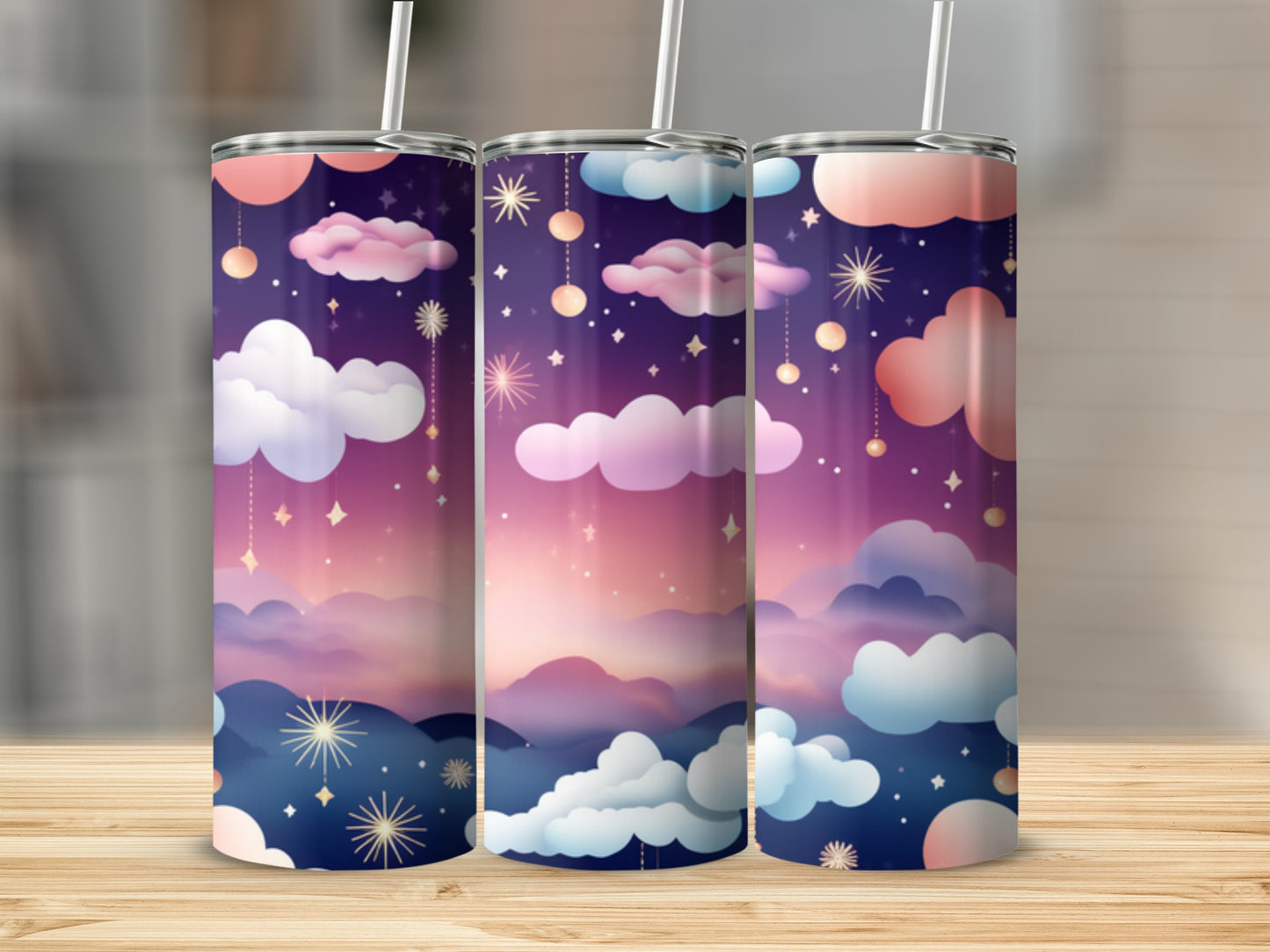 Three tumblers with a starry night sky and cloud pattern.