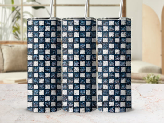 Three tall, patterned tumblers with a blue and white mosaic tile design.