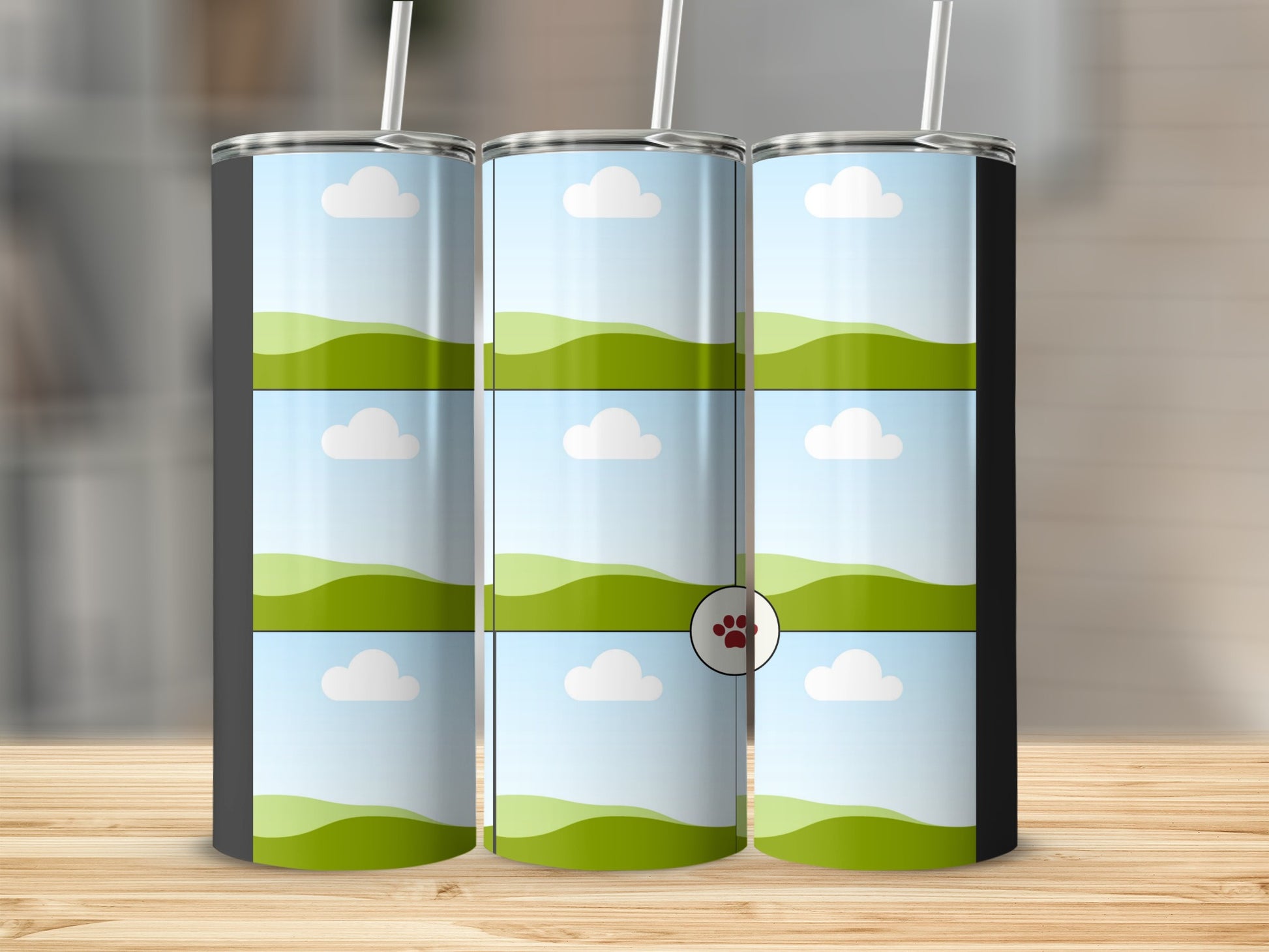 Three tumblers displayed with a repeating landscape and cloud design, featuring a paw print watermark.