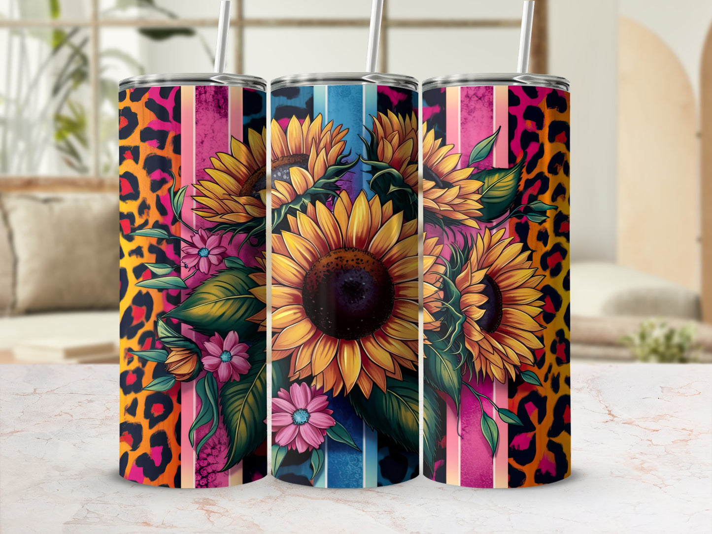 Three tumblers with sunflowers and leopard print designs.