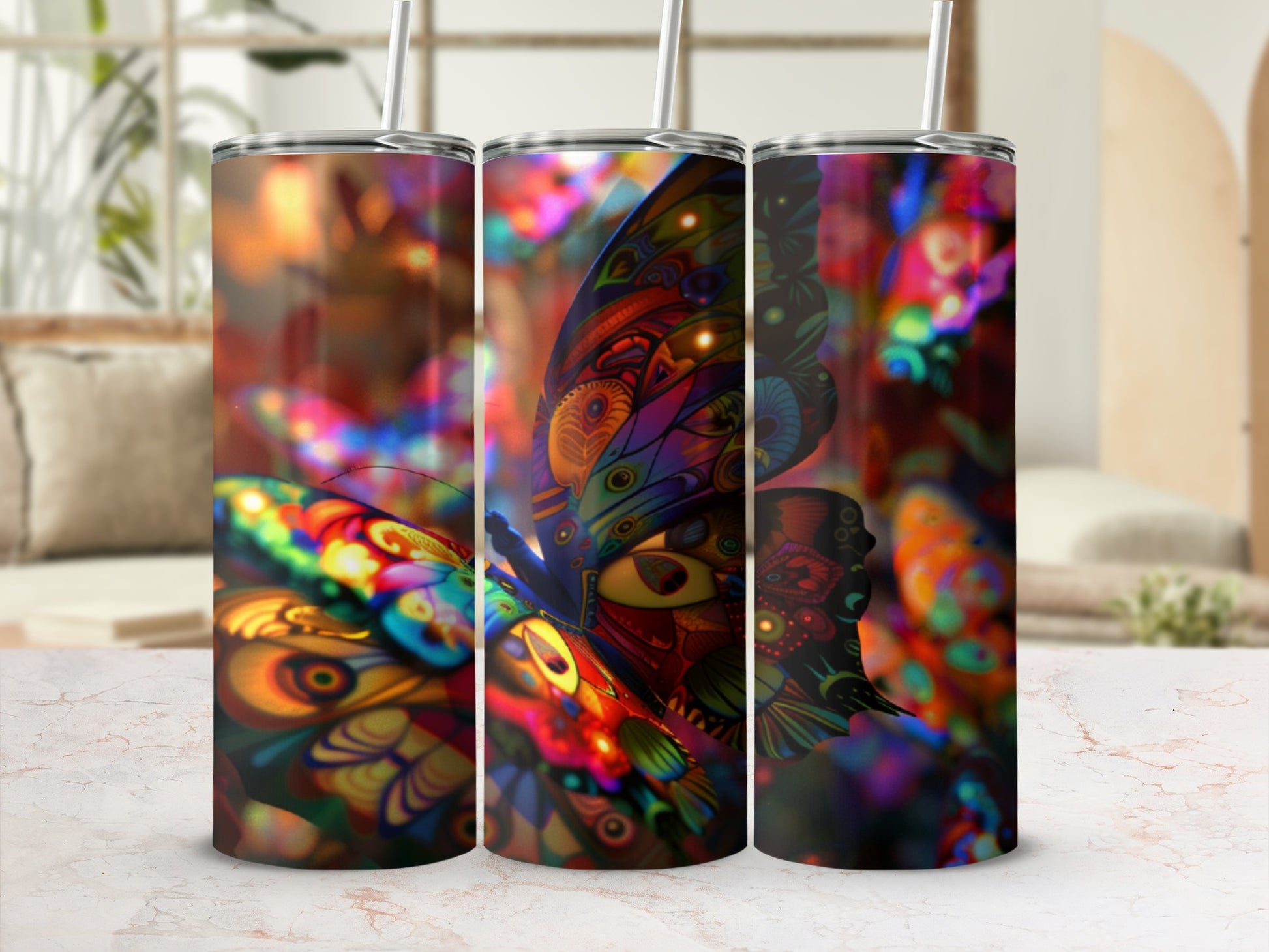 Triptych of tumblers featuring a colorful, detailed butterfly design.