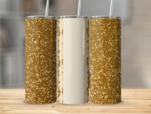 Three tumblers with gold glitter pattern and cream accents stand on a wooden surface.