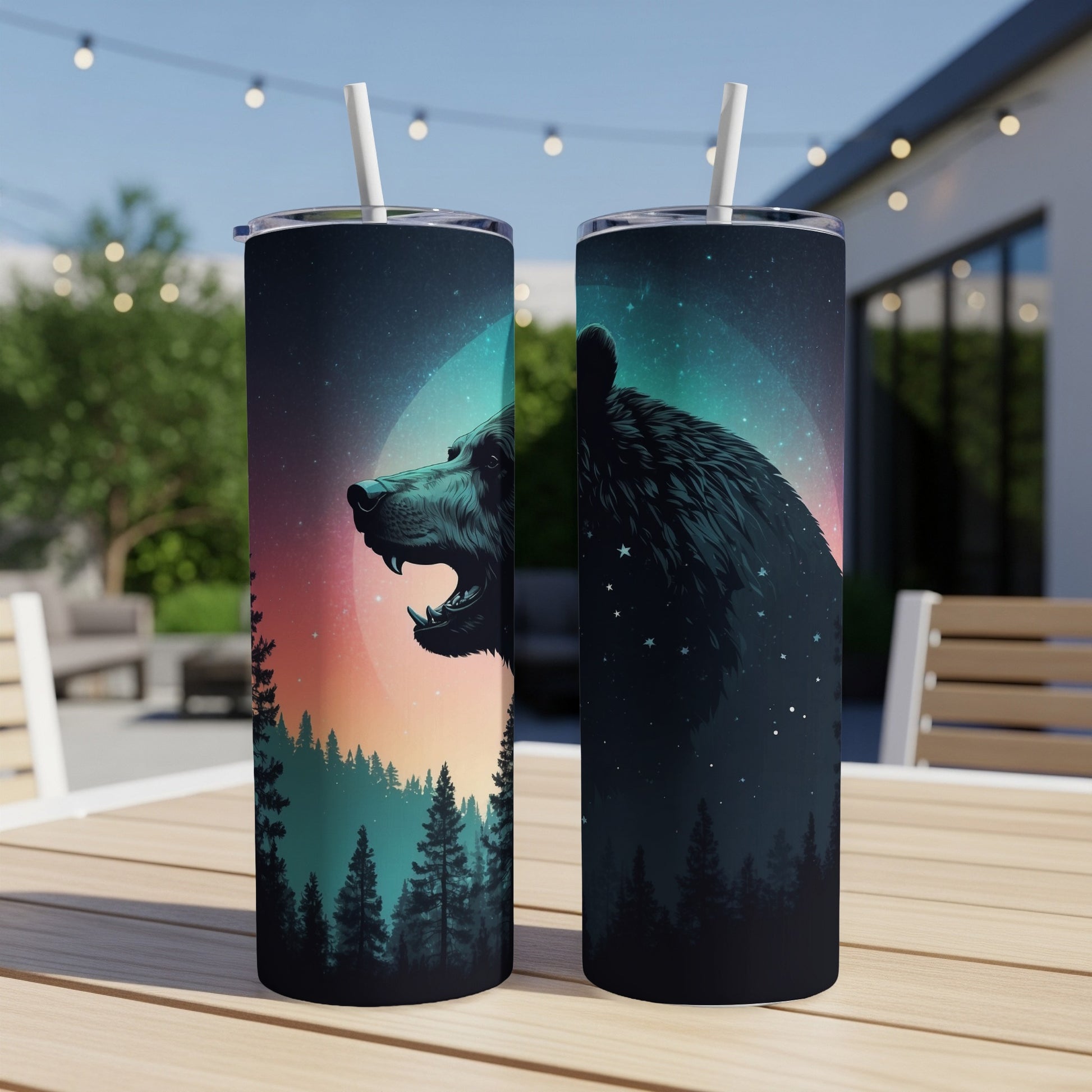 Two tumblers featuring a bear's profile against a starry night sky.