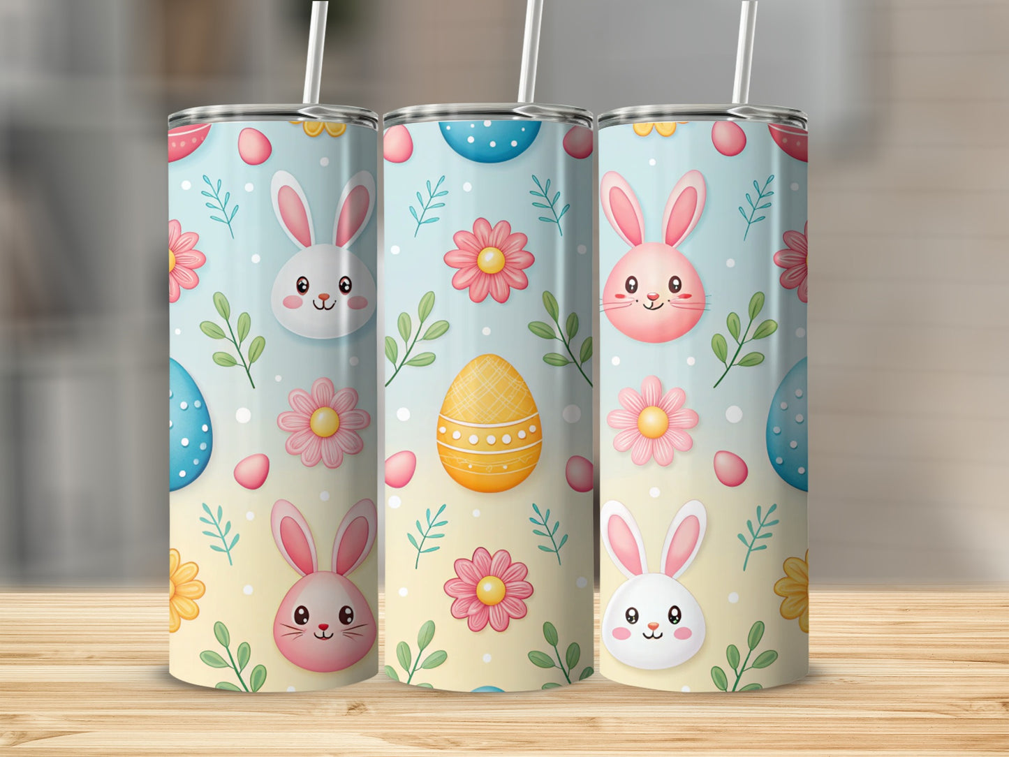 Easter tumblers with bunnies, flowers, and decorated eggs.