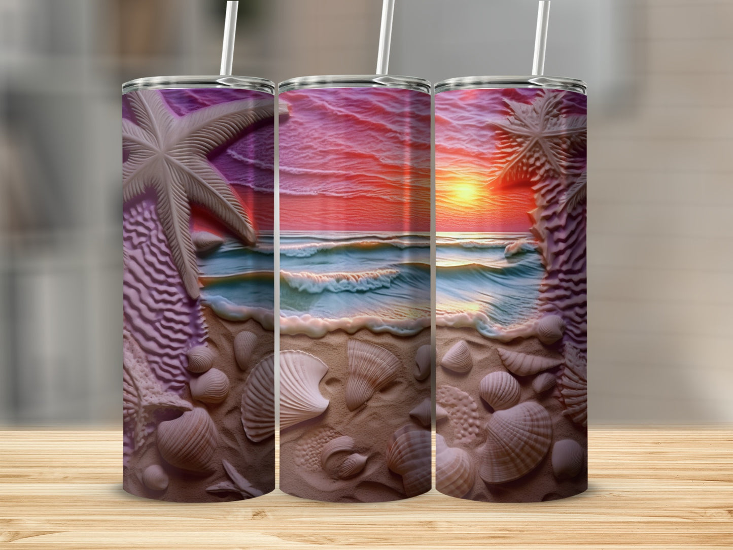 Three tumblers display a beach sunset scene with seashells and palm trees.