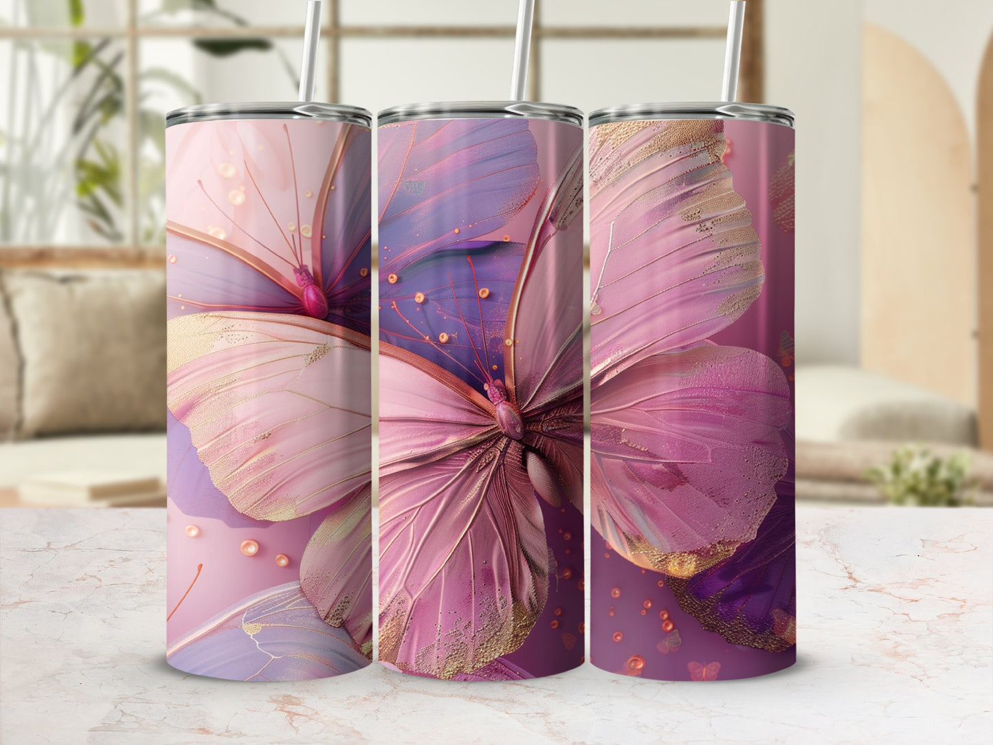 Three tumblers with a large pink butterfly and gold accents.