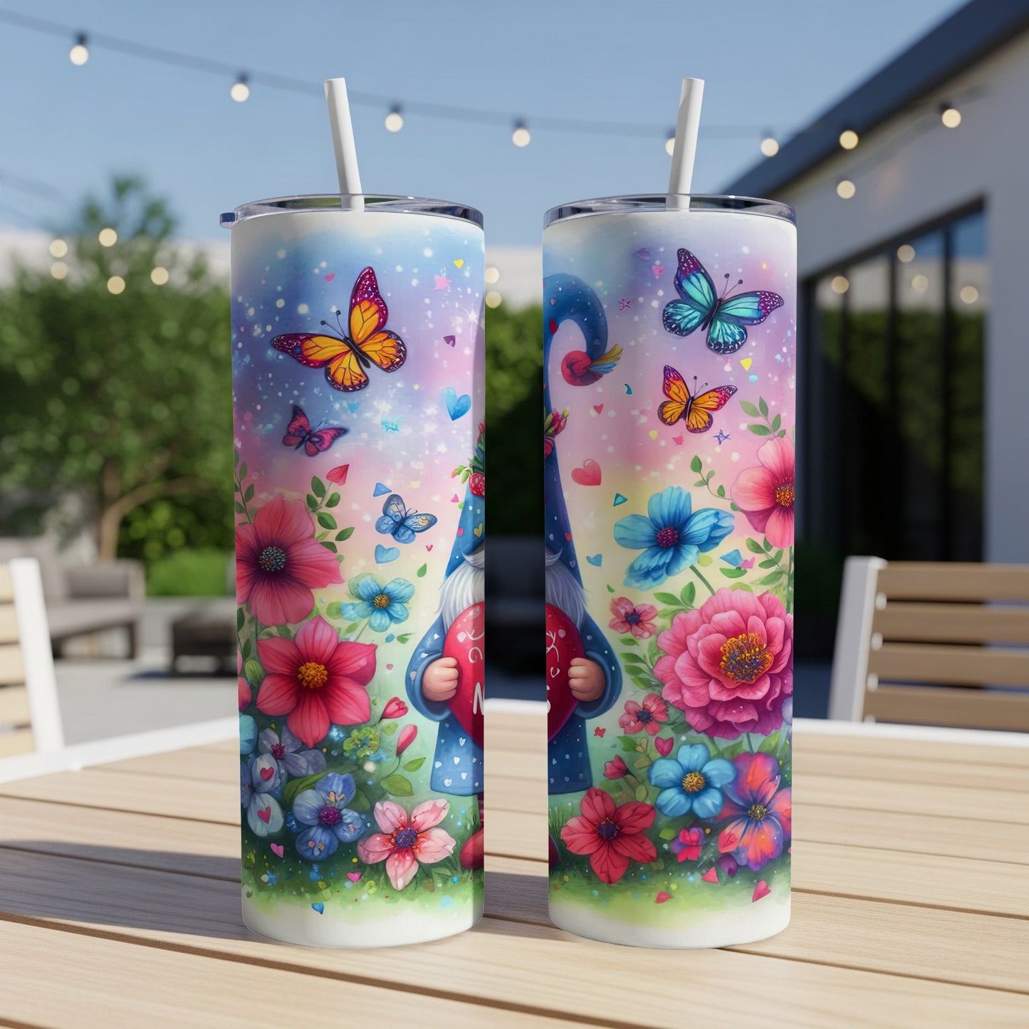 Two tall tumblers featuring a gnome and colorful flowers.