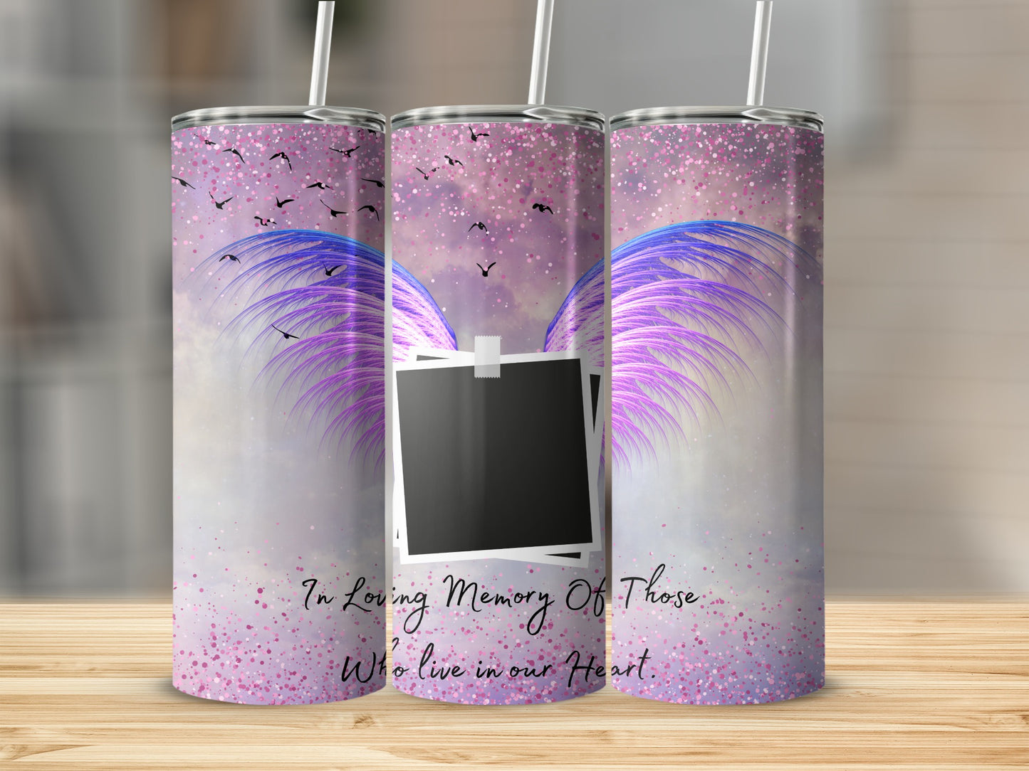 Tumbler with purple wings, birds, and text "In Loving Memory Of Those Who Live in our Heart."