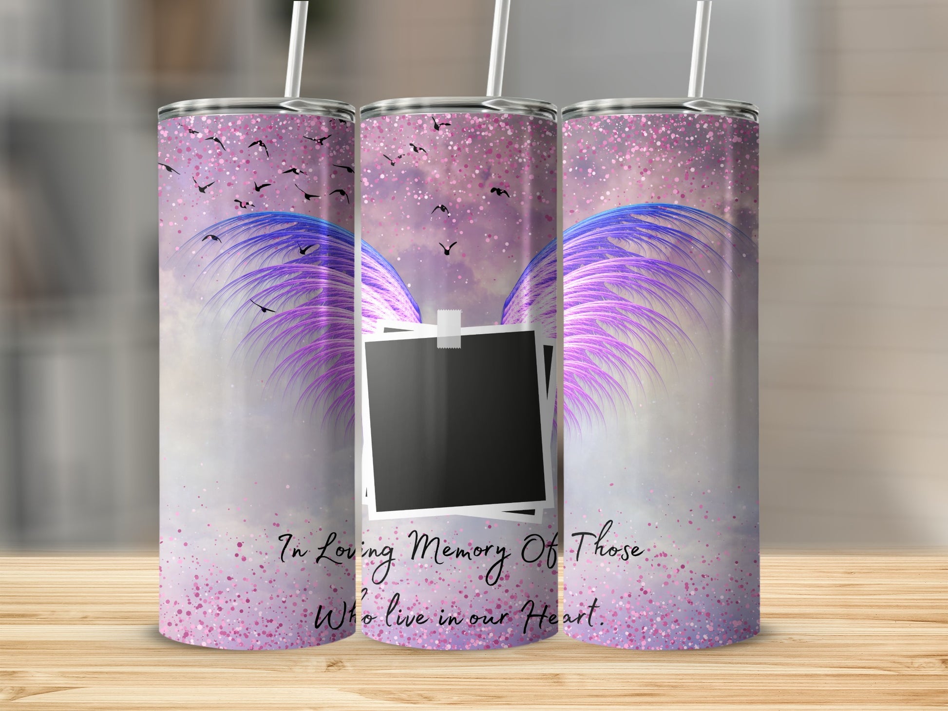 Tumbler with purple wings, birds, and text "In Loving Memory Of Those Who Live in our Heart."