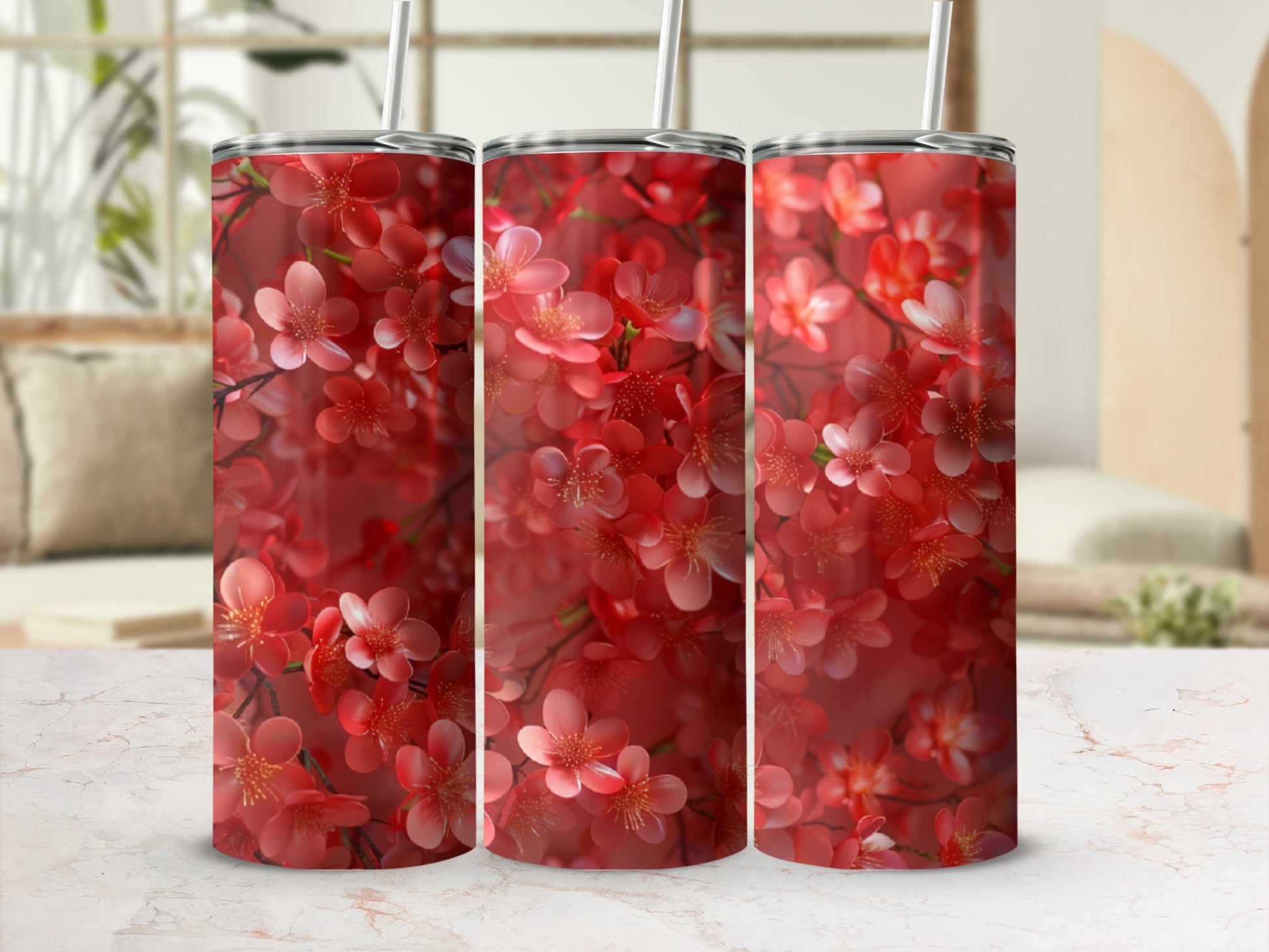 Three tumblers with a close-up coral floral pattern.