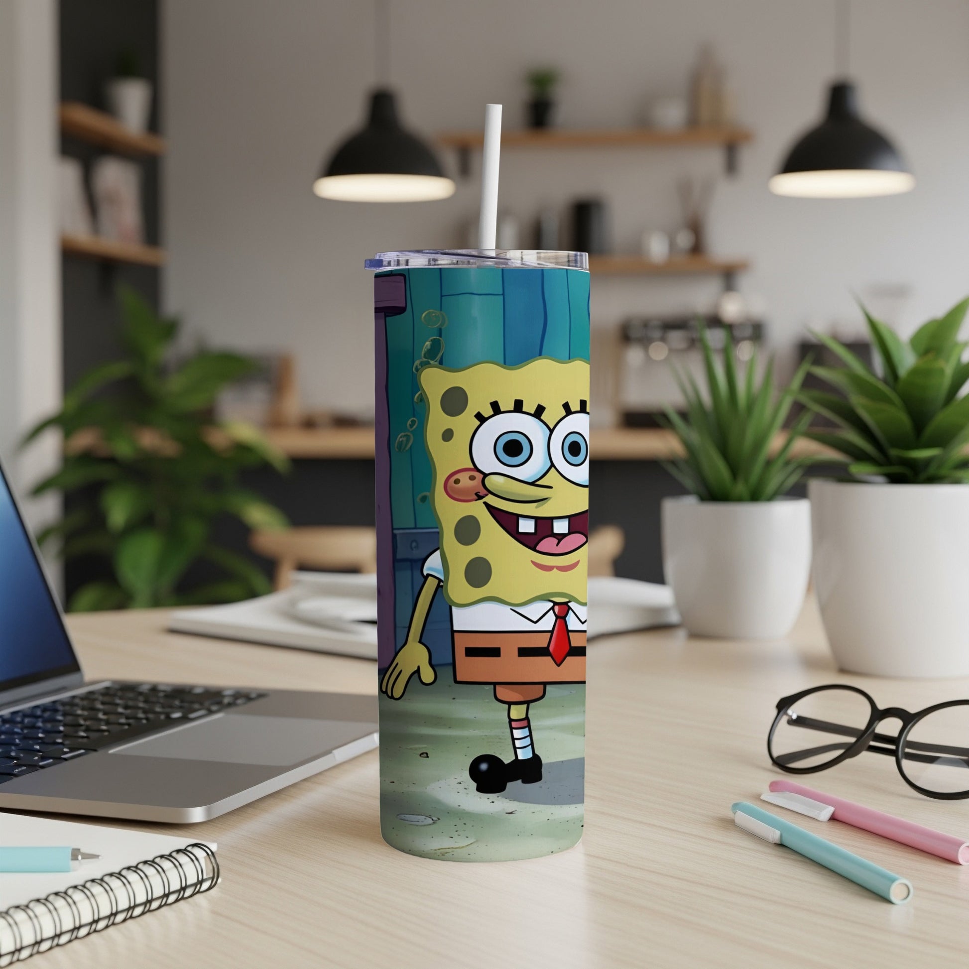SpongeBob SquarePants character on a blue wooden background on a skinny tumbler.