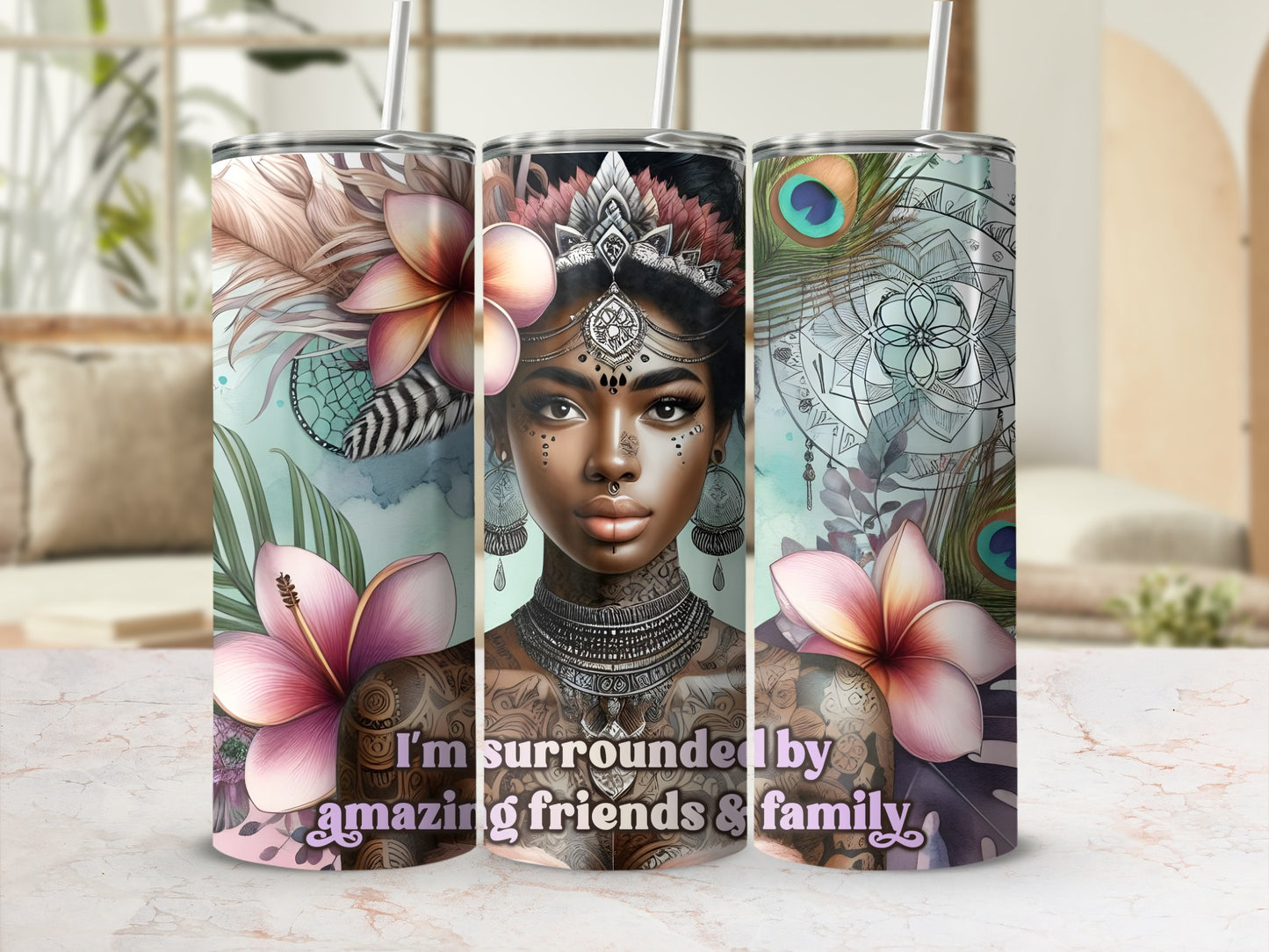 Tumbler with woman's portrait, flowers, peacocks, and text "I'm surrounded by amazing friends & family."