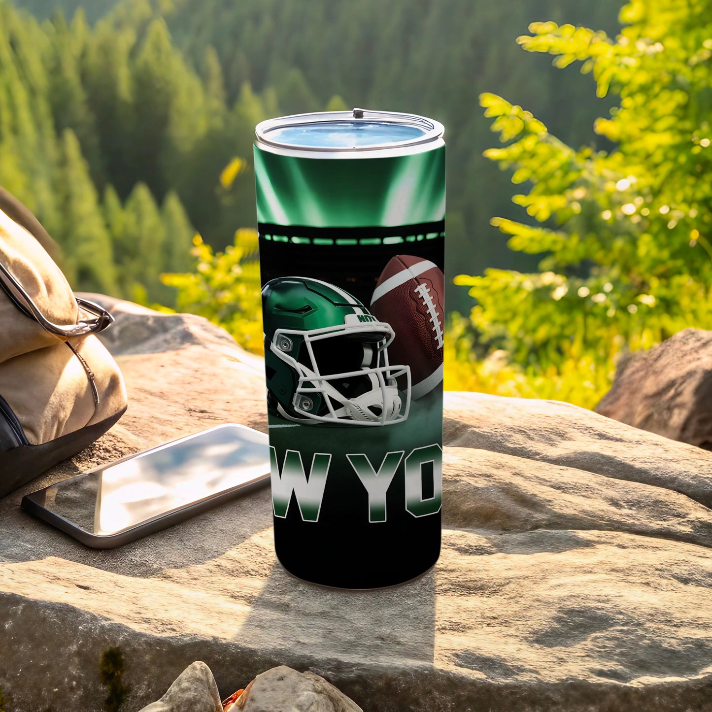 Green New York Jets football helmet and ball on tumbler.
