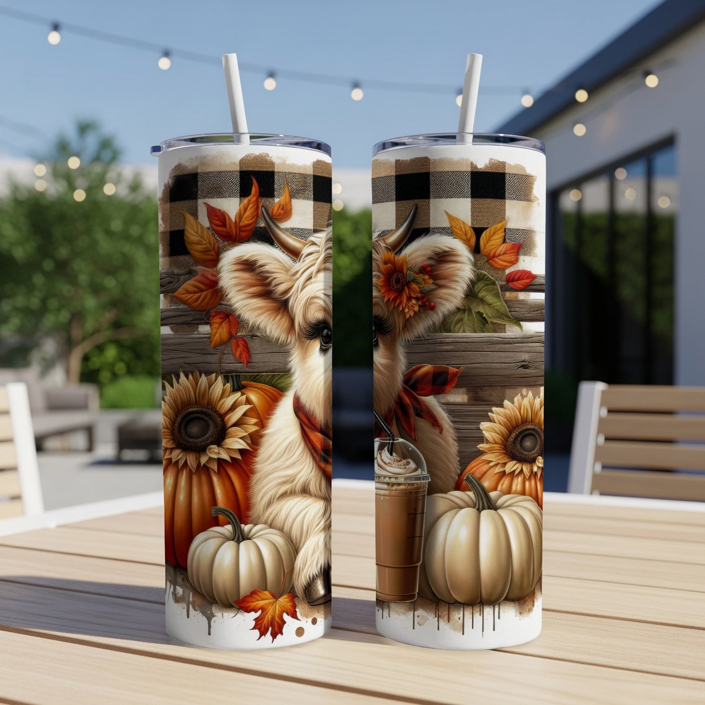 Two skinny tumblers with highland cow, pumpkins, sunflowers, and plaid design.