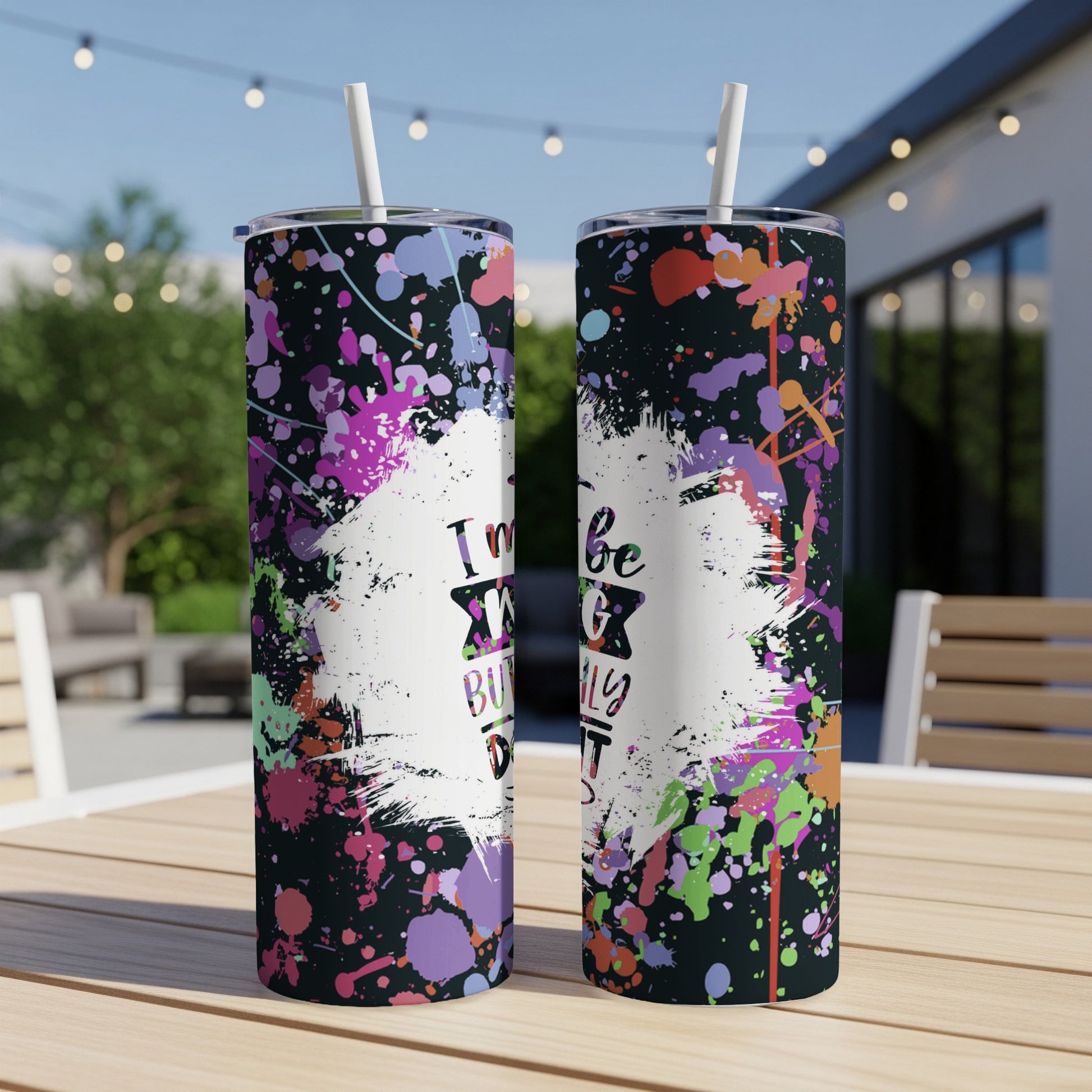 Black tumbler with colorful paint splatter and text "I'm to be buried..."