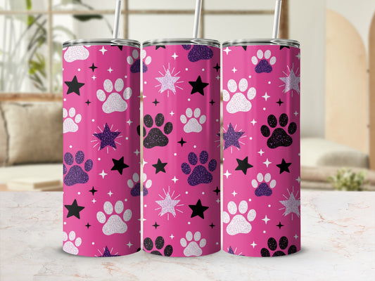 Pink tumbler with black and white paw prints and glitter stars.
