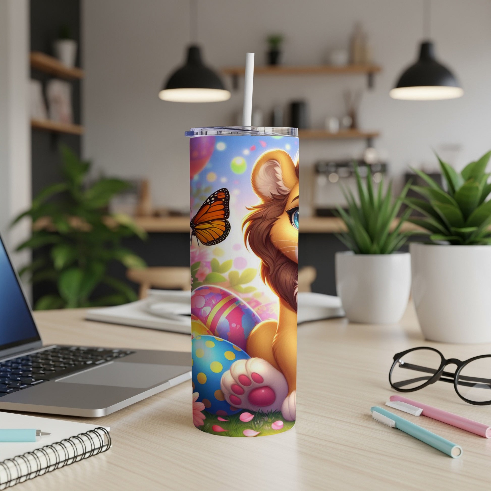 Lion with butterfly on colorful Easter eggs on a tumbler.