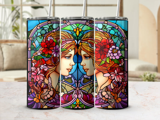Stained glass design featuring profile views of two women with floral accents.