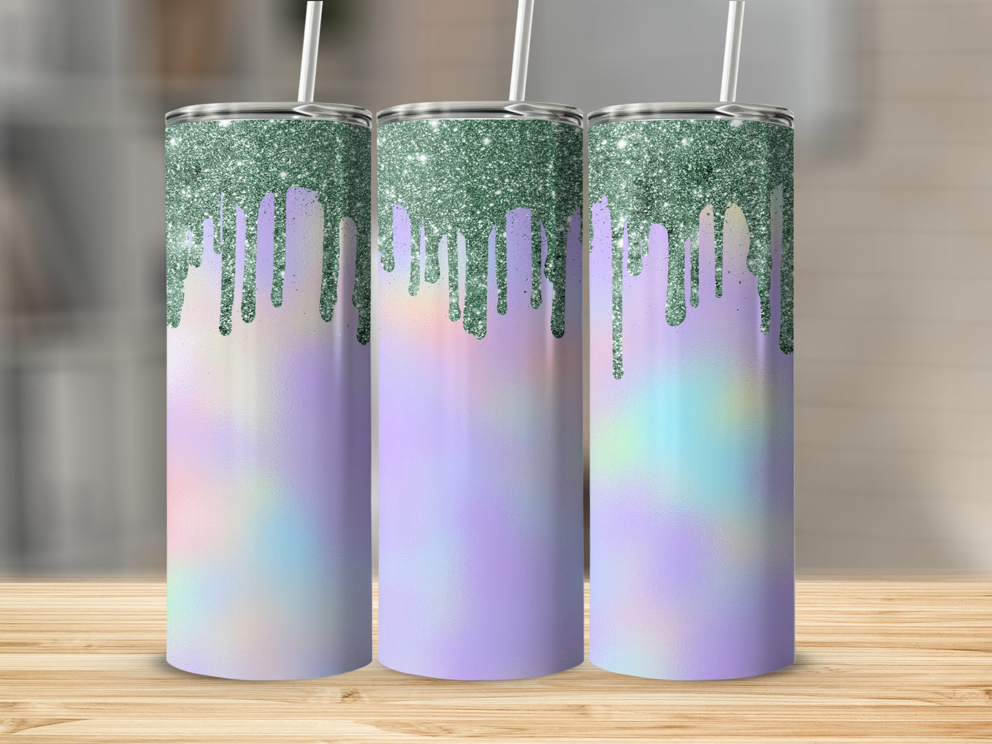 Three tumblers with green glitter drips and holographic purple, blue, and pink designs.