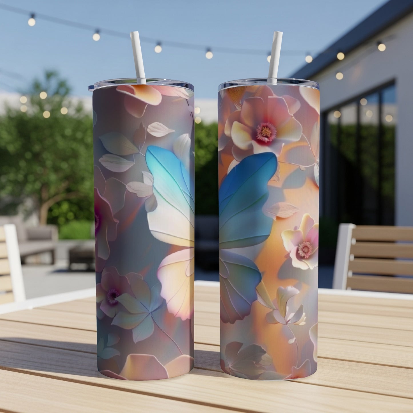 Two tall tumblers with a pastel butterfly and floral design.