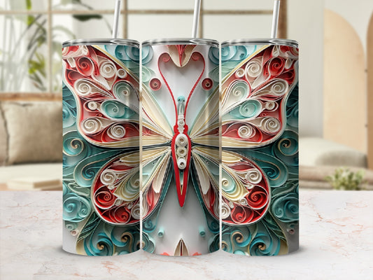 Quilled butterfly design on three stainless steel tumblers.